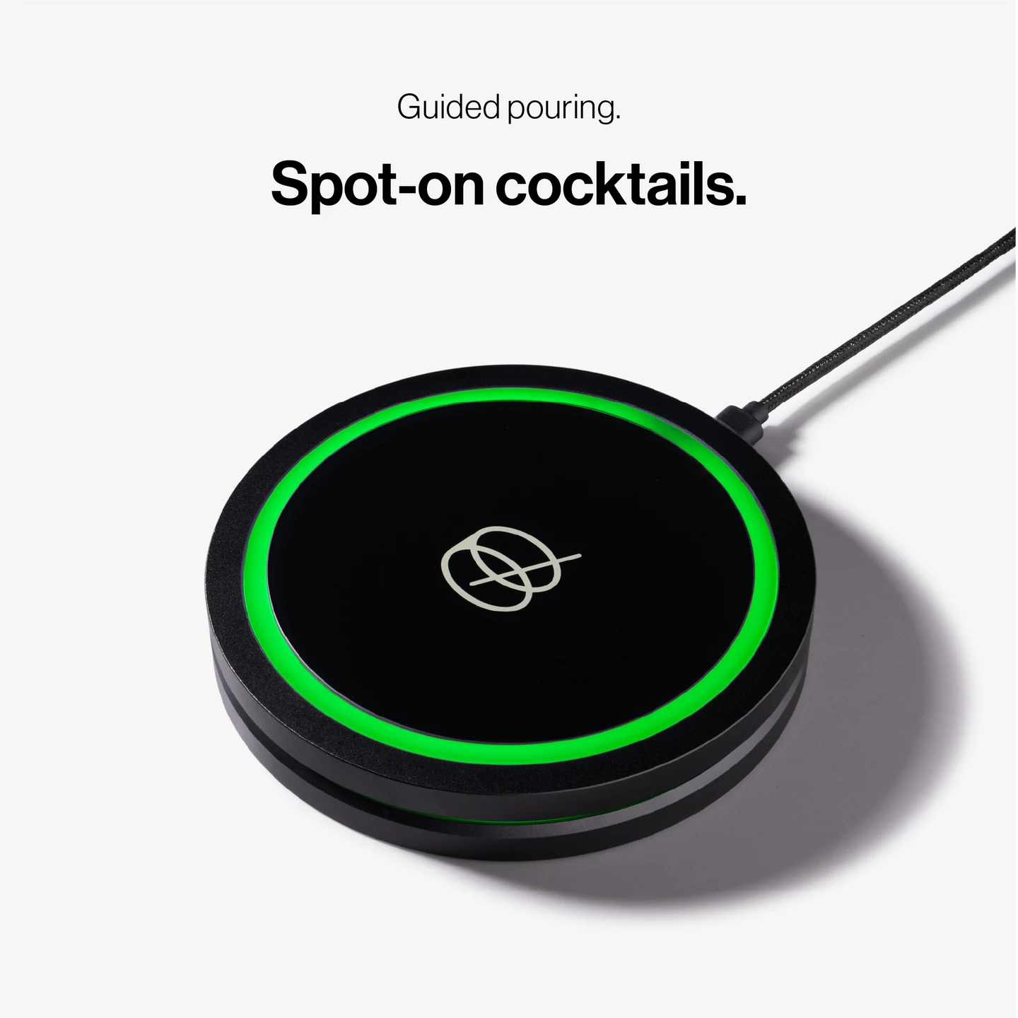 Panel text: “Guided pouring. Spot-on cocktails.” Angled view of the black Coaster 2.0 with its ring illuminated green.